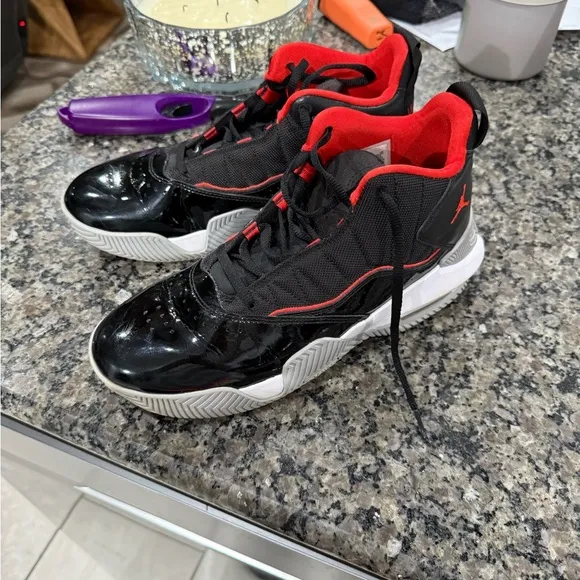 Air Jordan Youth high top tennis shoe.