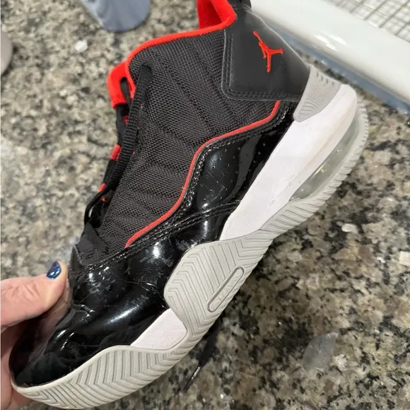 Air Jordan Youth high top tennis shoe.