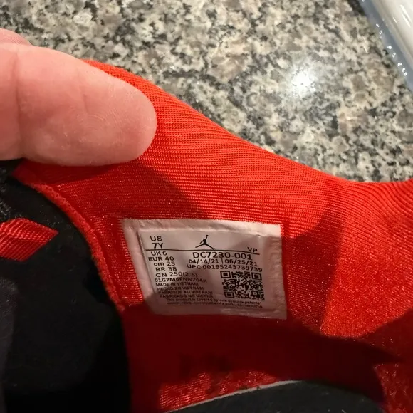 Air Jordan Youth high top tennis shoe.