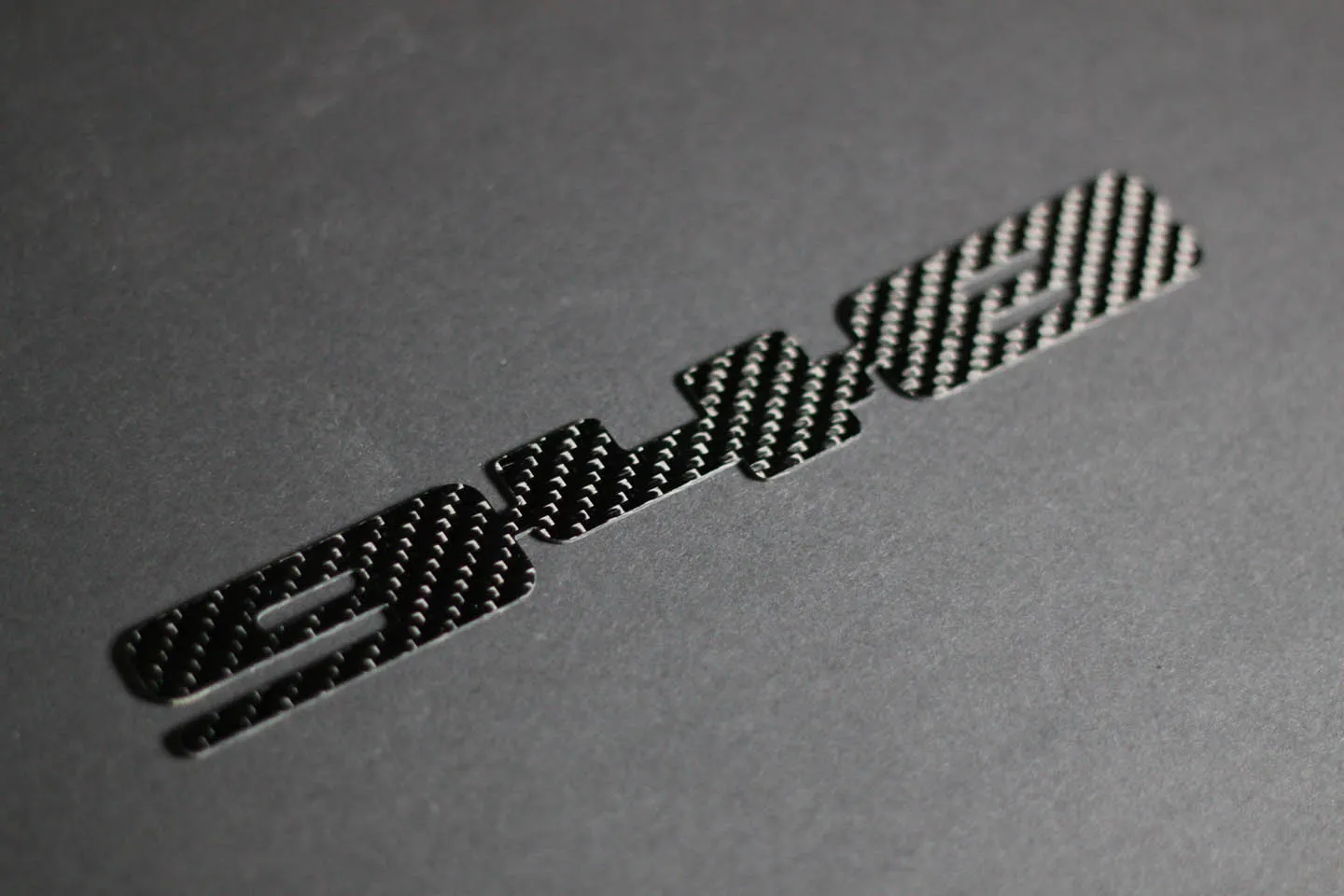 Carbon fiber "948" badge