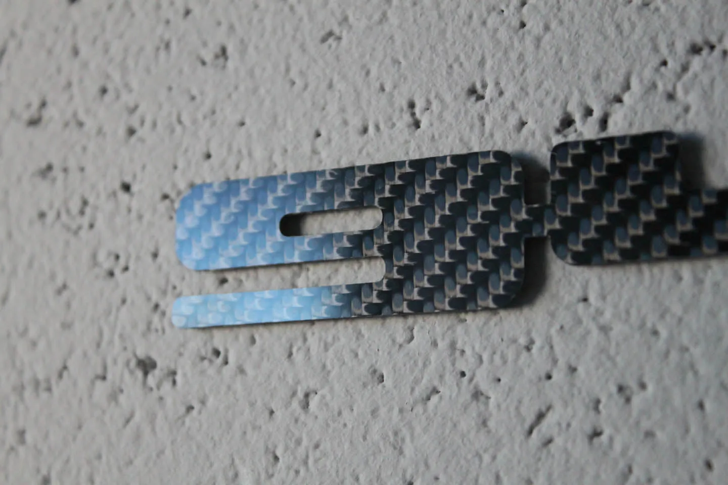 Carbon fiber "948" badge