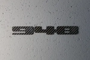 Carbon fiber "948" badge