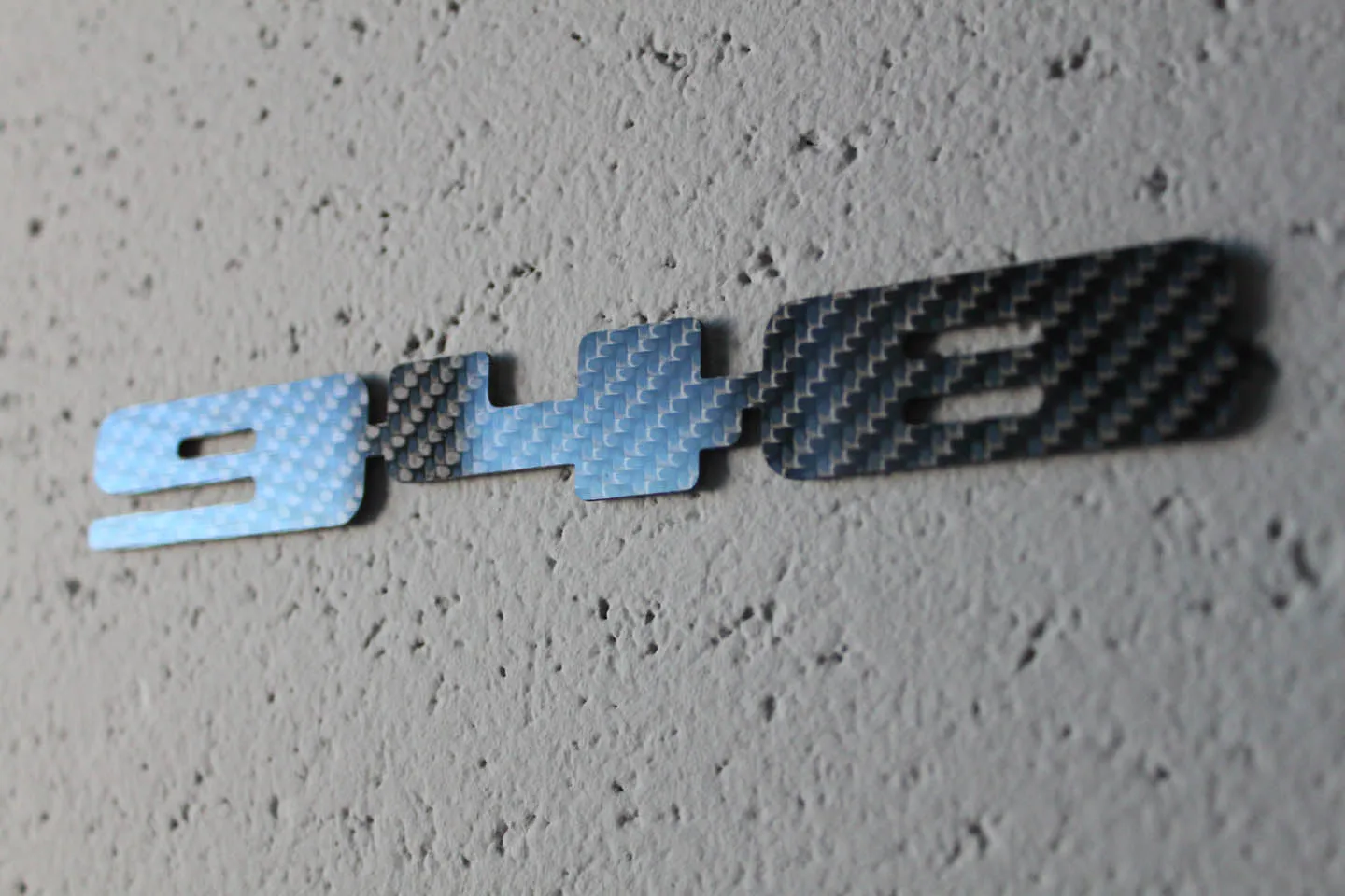 Carbon fiber "948" badge