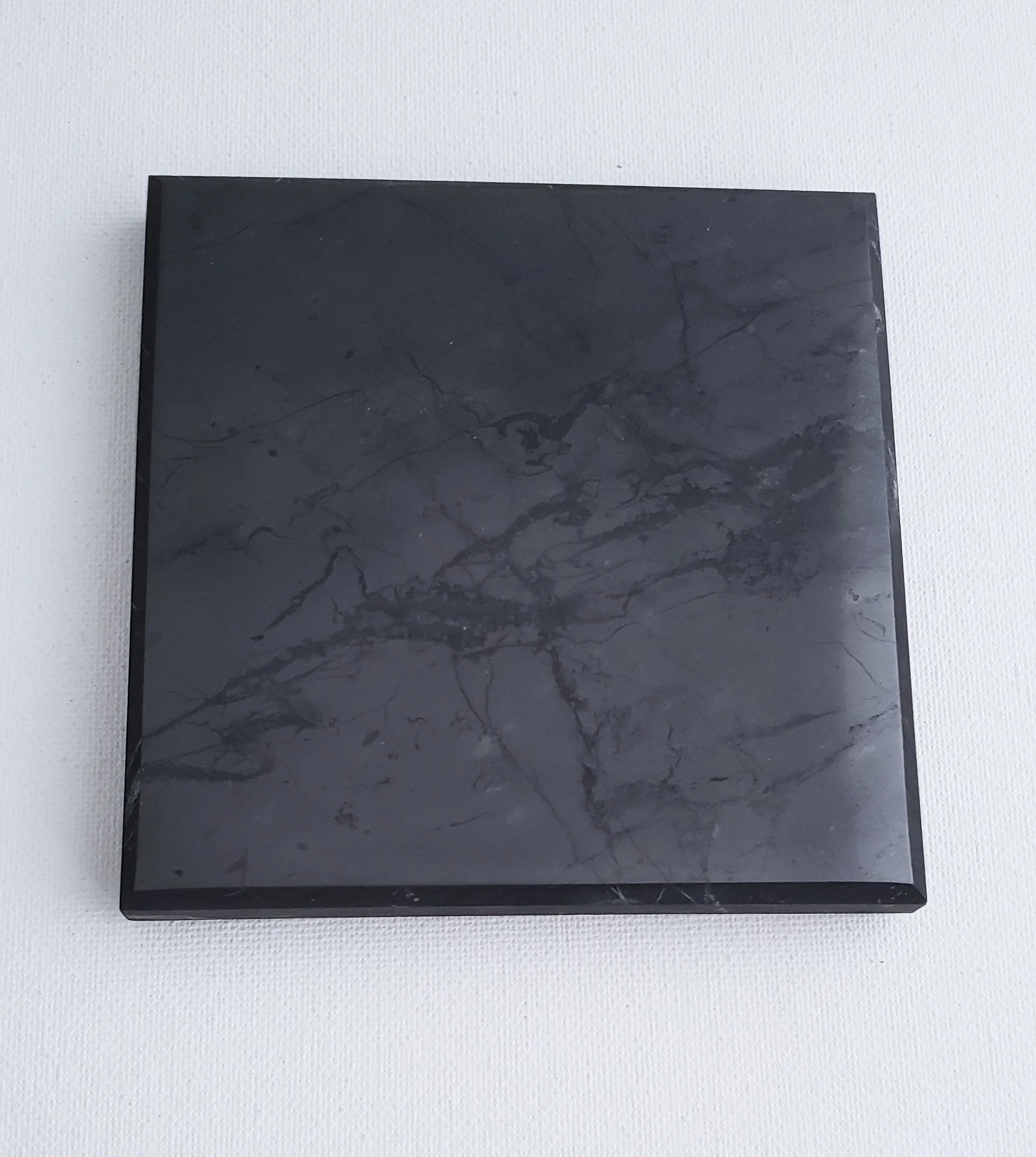 Shungite Charging and Cleaning Plate for Stones and Jewelry.